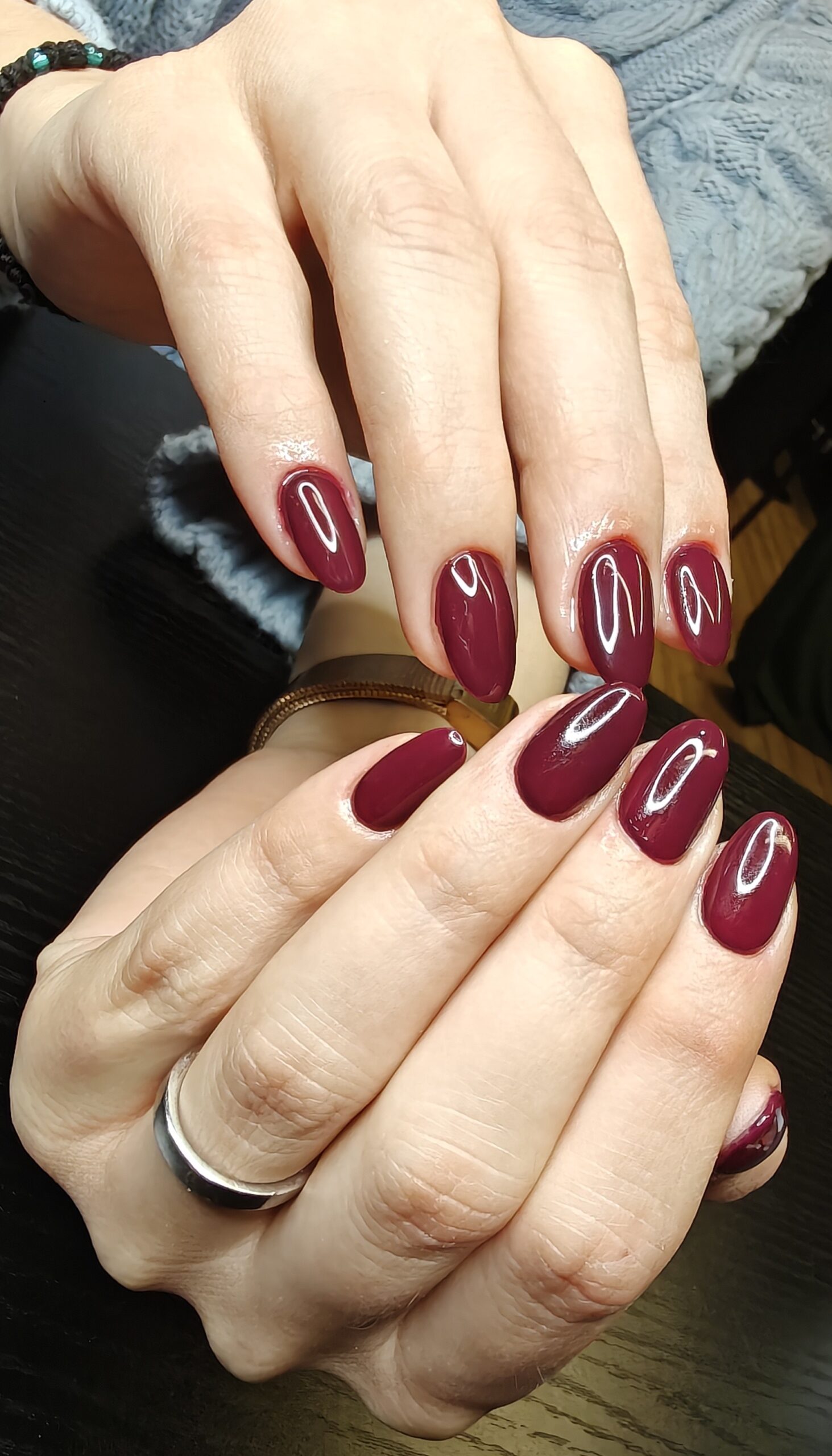 Full glam evening makeup look with bold red lips and smokey eyes by Makeover by Rafaella.