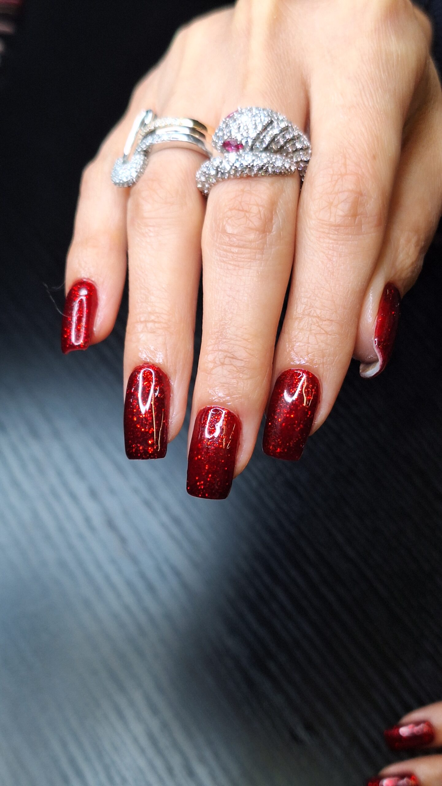 Vibrant prom makeup and hairstyle transformation by Makeover by Rafaella.